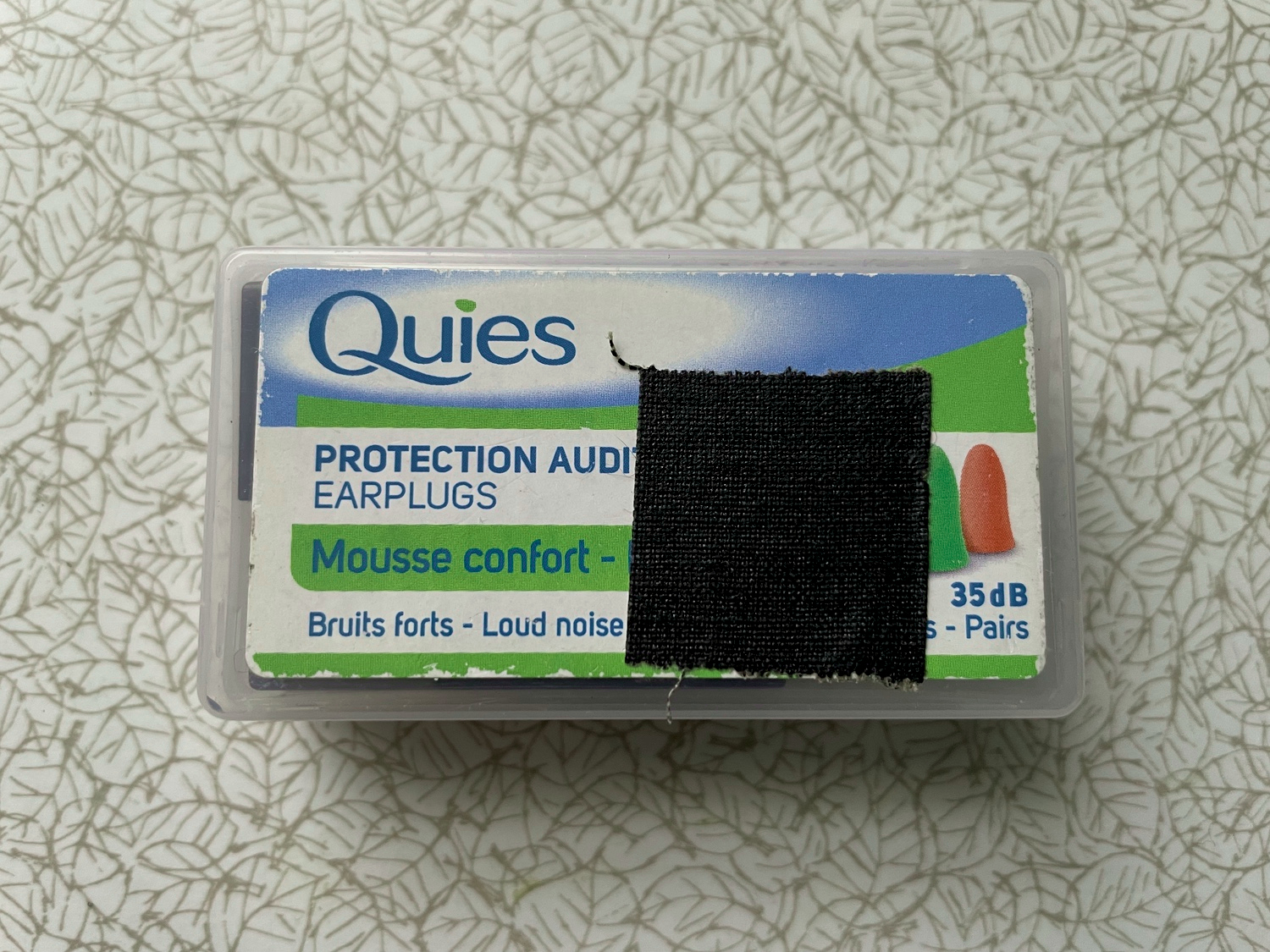 Quies ear protector box protecting my spare battery.