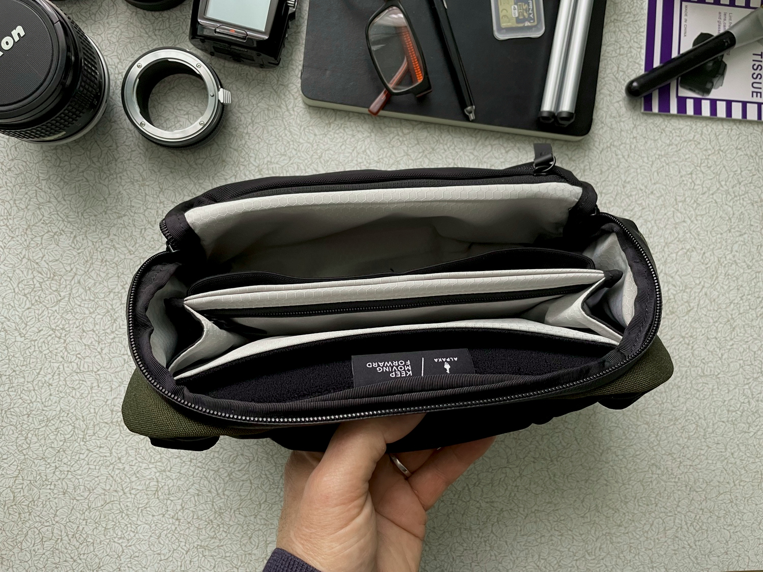 The Alpaka Vertex bag open and empty inside.