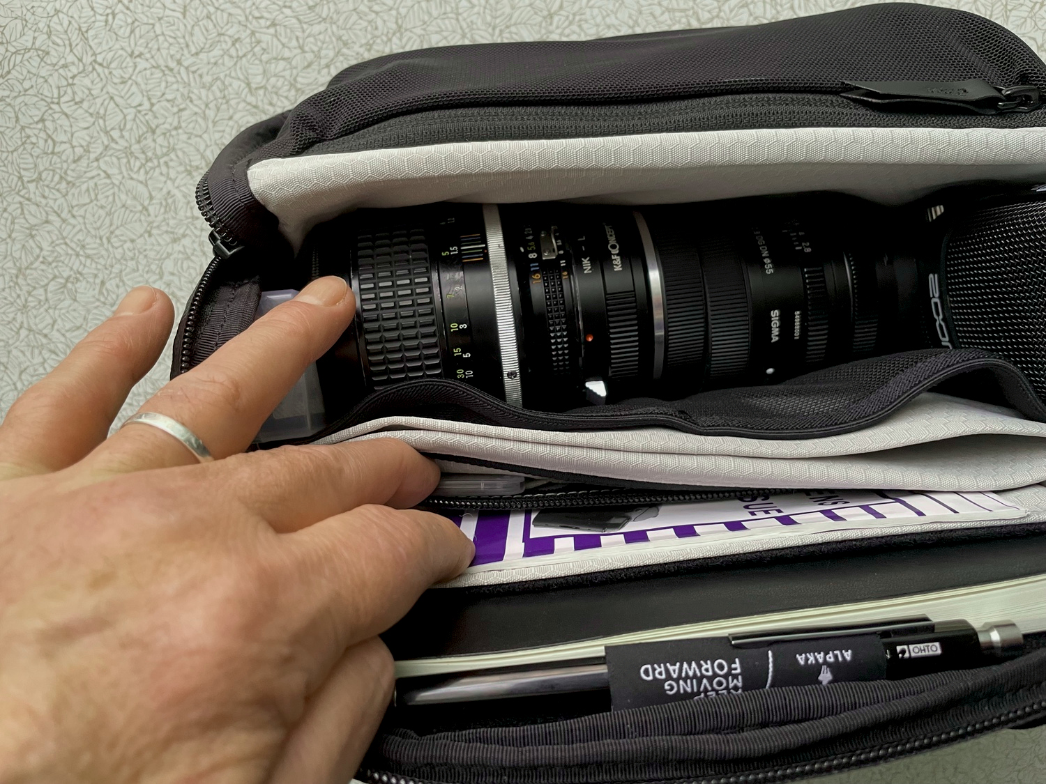 Showing the zipped inner compartments.